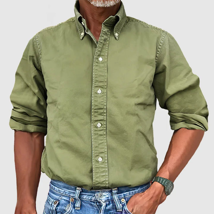 Men's classic long-sleeve shirt with buttons, offering style and comfort for diverse occasions.