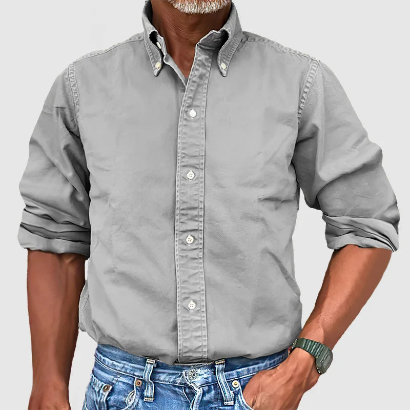 High-quality men's long-sleeve collared shirt, perfect for business meetings or relaxed weekend wear.