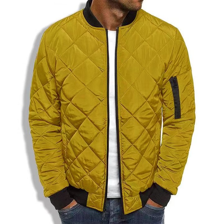 Comfortable men's quilted bomber jacket for everyday style. A warm and casual fall/winter outerwear option.