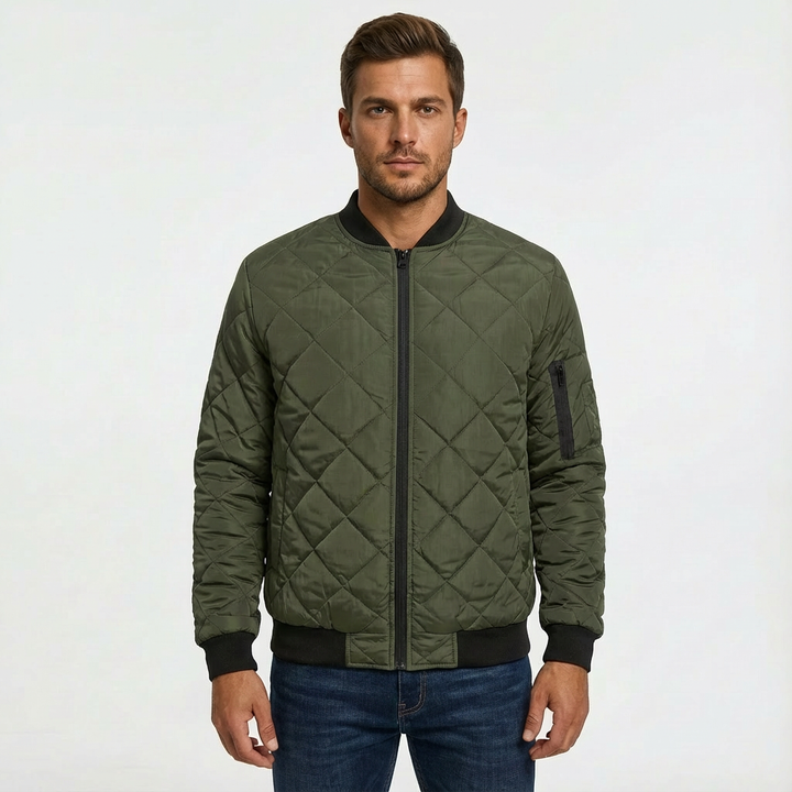 Men's zip-front quilted bomber jacket for casual everyday wear. Ideal layering piece for fall and winter.