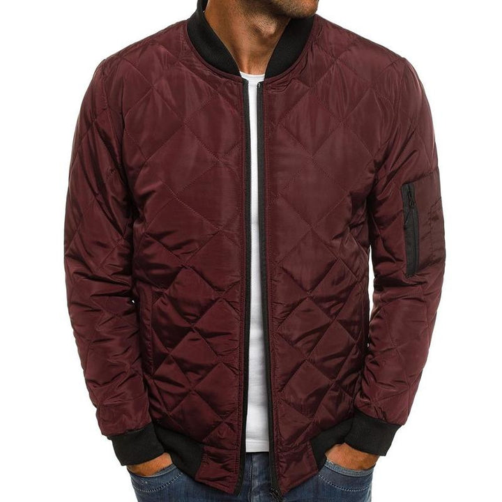 Back view of a men's stylish quilted bomber jacket, ideal for casual fall and winter outerwear.