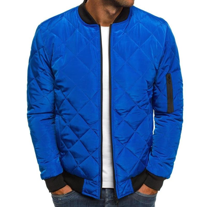 Close-up of men's classic quilted bomber jacket showing zip front and ribbed collar. Everyday fall style.