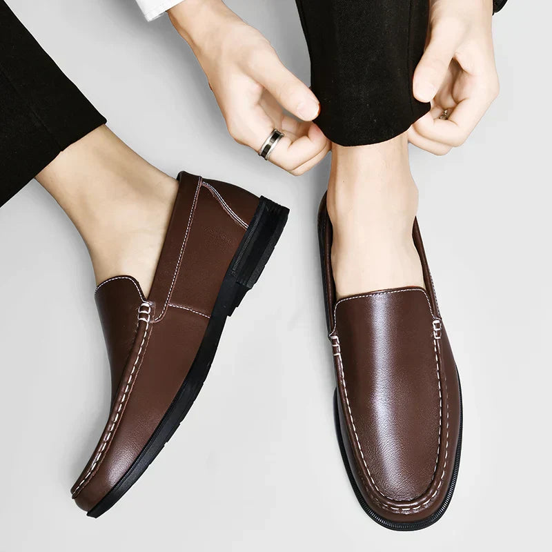 Sleek men's slip-on loafers, classic design for modern men's fashion & comfort.
