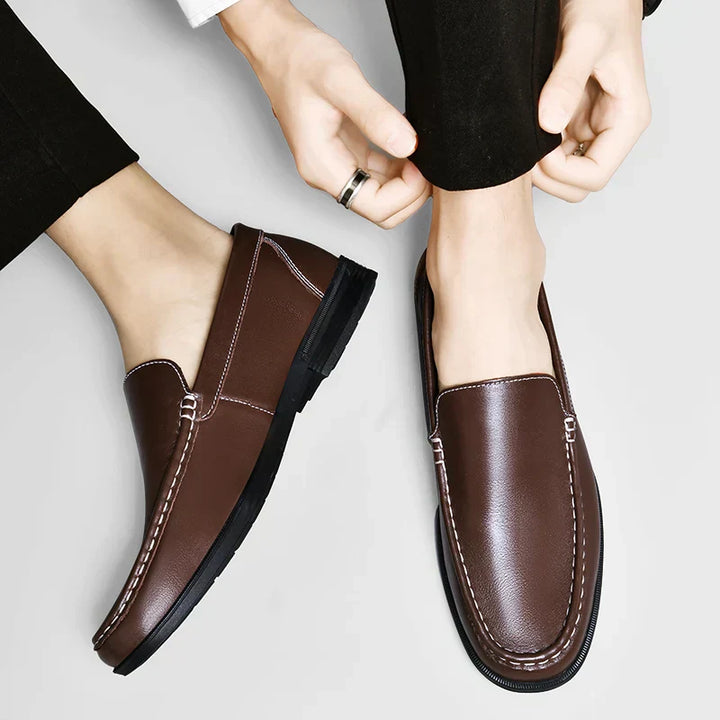 Sleek men's slip-on loafers, classic design for modern men's fashion & comfort.