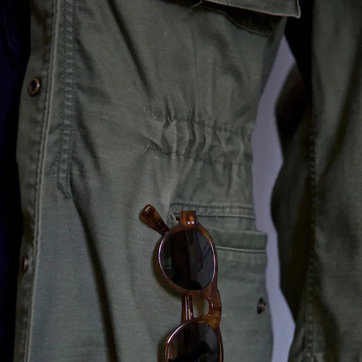 Classic men's field jacket for fall & spring layering. Adjustable fit, vintage style, versatile casual outerwear.