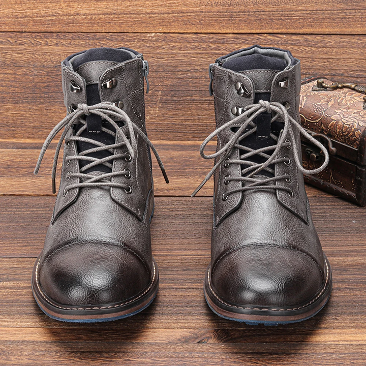 Front view: Men's vintage lace-up ankle boots, showcasing classic design & durable construction.