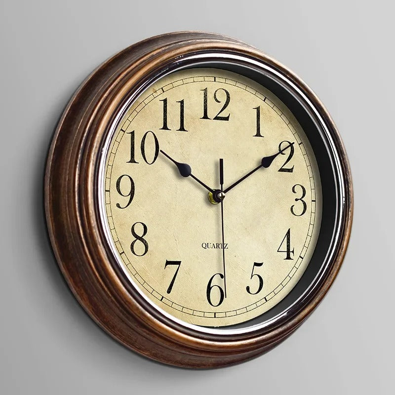 Timeless silent wall clock for home and office, featuring classic design, brown finish, and Roman numeral display