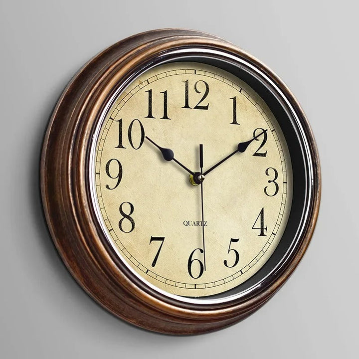 Timeless silent wall clock for home and office, featuring classic design, brown finish, and Roman numeral display
