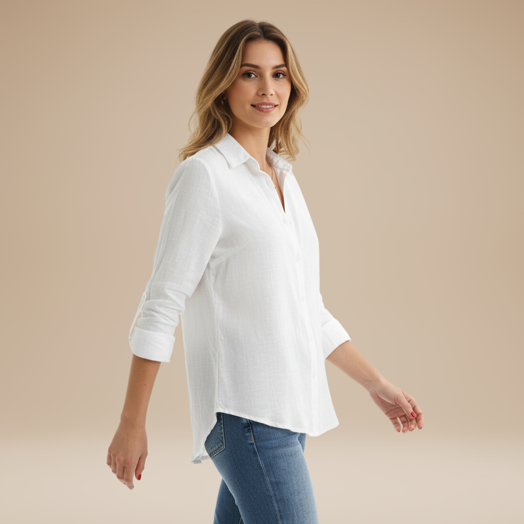 Crisp white women's long-sleeve button-up shirt, an essential classic for professional office wear.