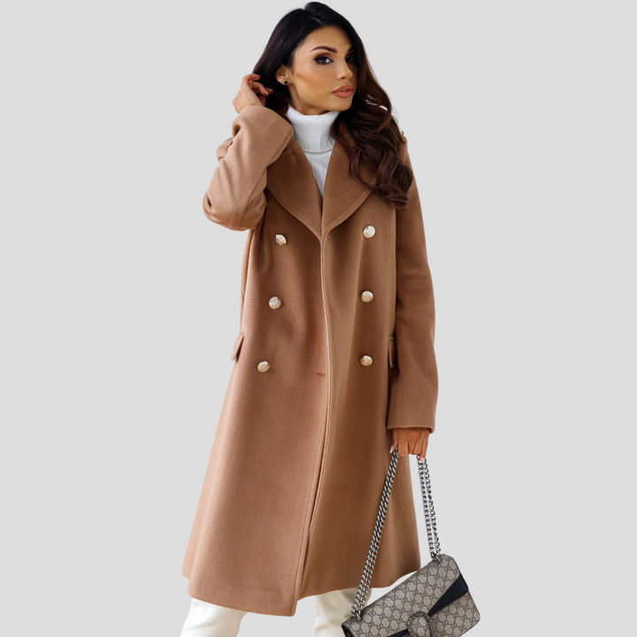 Warm women's double-breasted long coat in a neutral shade, designed for winter elegance.