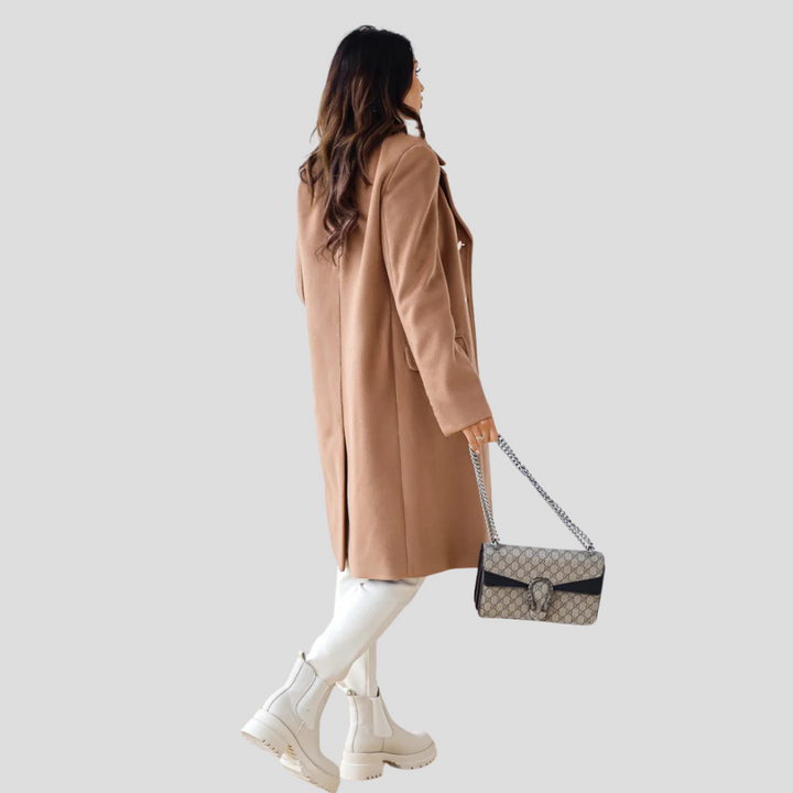 Classic tailored women's double-breasted long coat, a sophisticated choice for any season.
