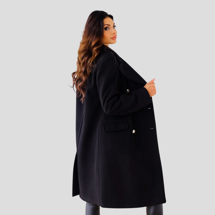 Tailored women's long coat, double-breasted design, offering sophisticated business attire.