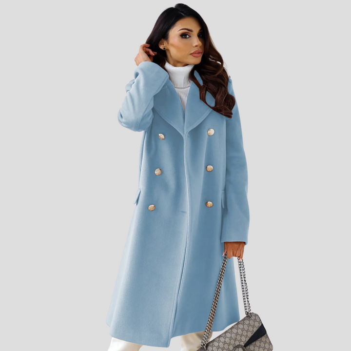 Sophisticated women's outerwear: a classic double-breasted long coat in a neutral color.