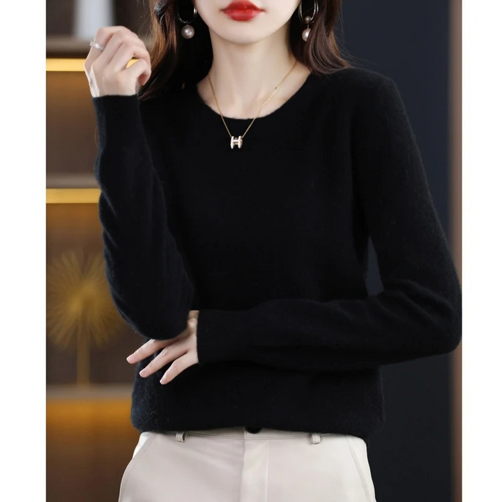 Back view of women's classic round neck pullover, soft knit for everyday versatile style.
