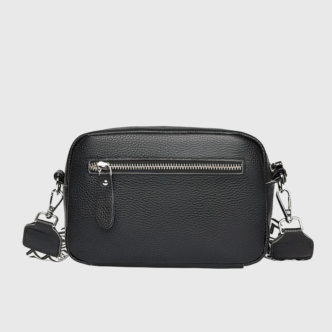 Versatile women's crossbody bag with a timeless design, ideal for carrying essentials with style.