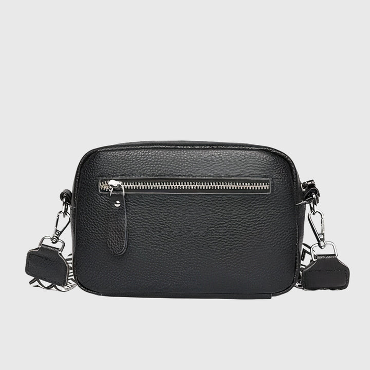 Versatile women's crossbody bag with a timeless design, ideal for carrying essentials with style.
