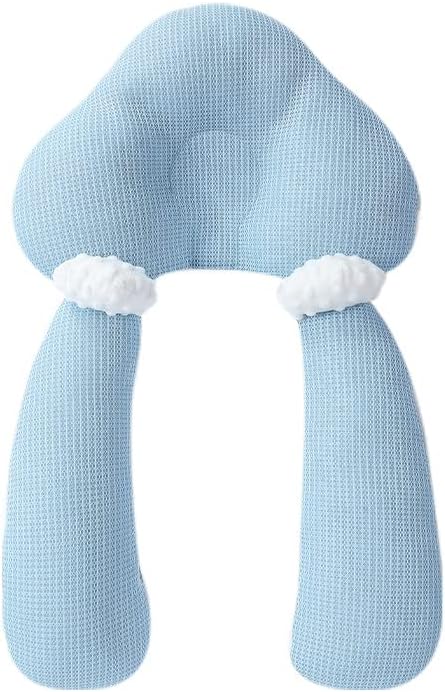 Close-up of a baby sleeping peacefully in a soft, breathable ergonomic cuddle nest.