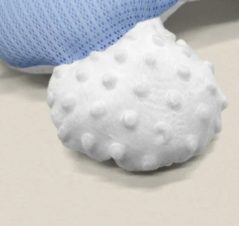 Close-up of the baby nest's soft, hypoallergenic material, perfect for newborn comfort.