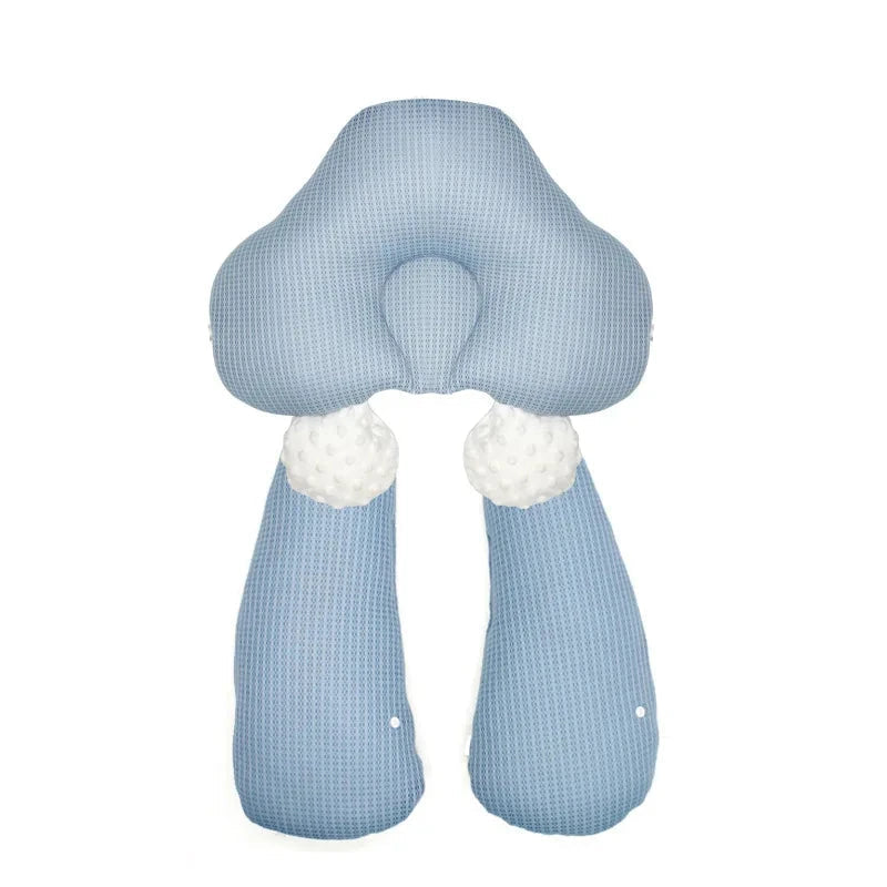 High-angle view of the infant sleep cuddle nest, emphasizing its ergonomic shape.