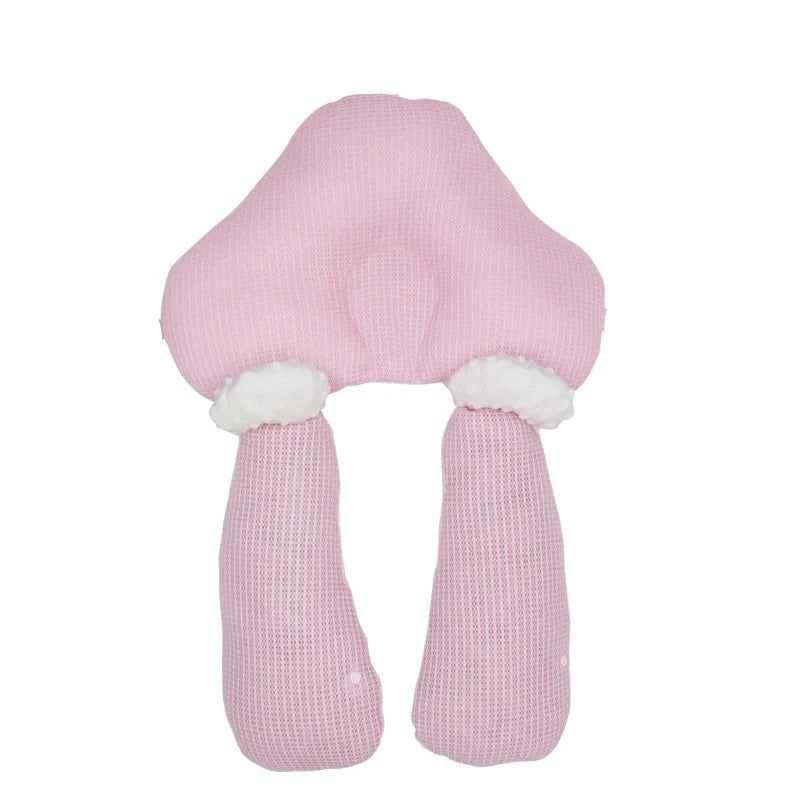 Ergonomic baby nest made from soft cotton, providing a safe and snug infant sleep space.