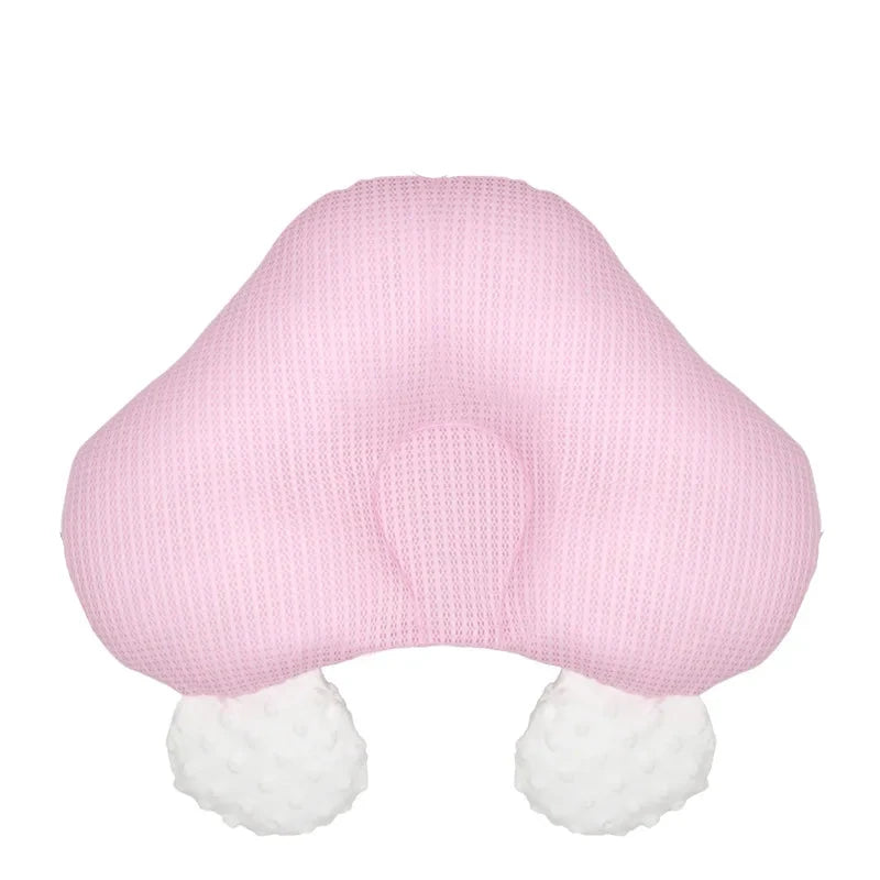 Baby's cuddle nest in a living room setting, highlighting its portability and comfort.