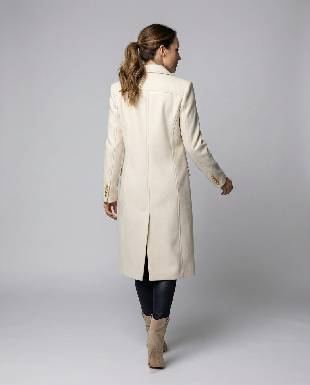 Full shot of a stylish women's warm winter coat for daily wear, double-breasted design.