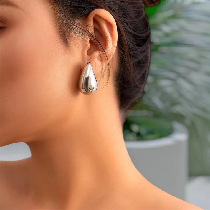 Delicate gold dangle earrings, women's jewelry that adds an elegant touch to your style.