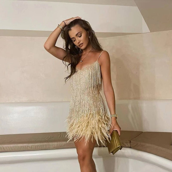 Sequin mini dress with delicate details, designed for a chic and glamorous summer party look