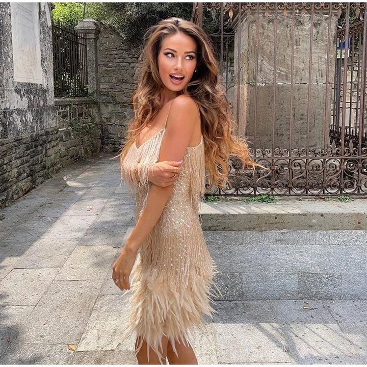 Model wearing a flattering sequin cocktail mini dress, showcasing summer party style