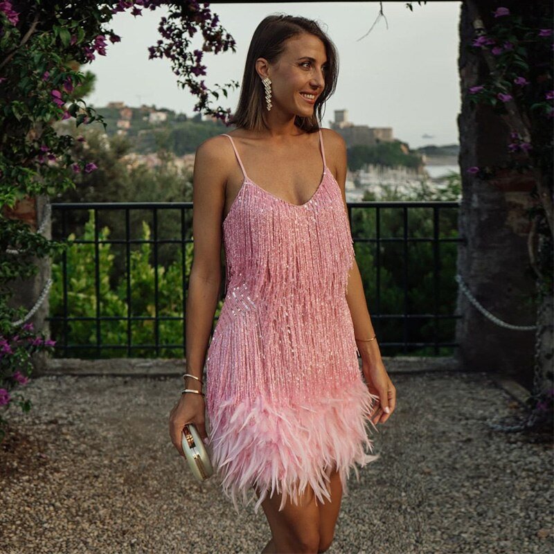Trendy sequin mini dress for women, embodying summer fashion and party readiness