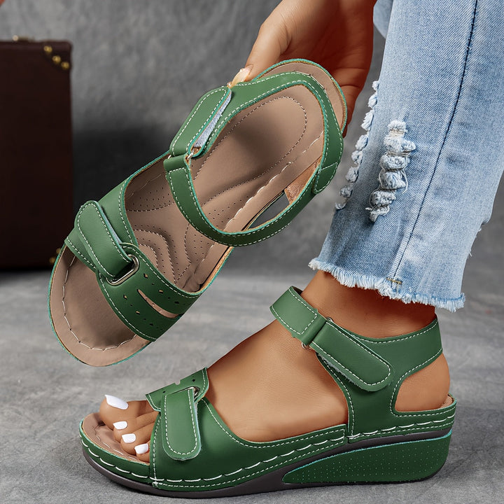 Stylish women's summer sandals, ergonomic design for healthy feet & cushioned comfort.