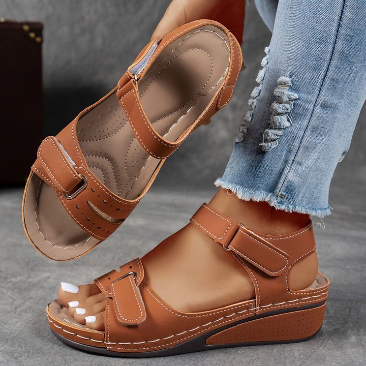 Women's comfort sandals featuring adjustable straps, orthopedic design for healthy & happy feet.