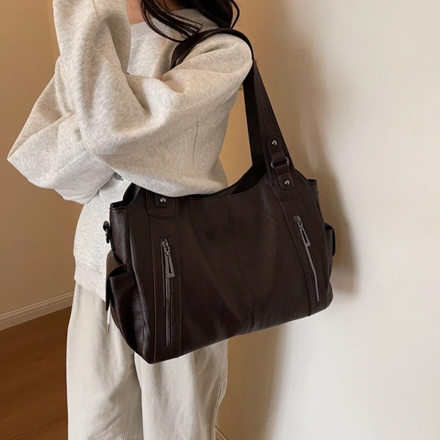 Stylish women's shoulder bag made from high-quality vegan leather, available in black