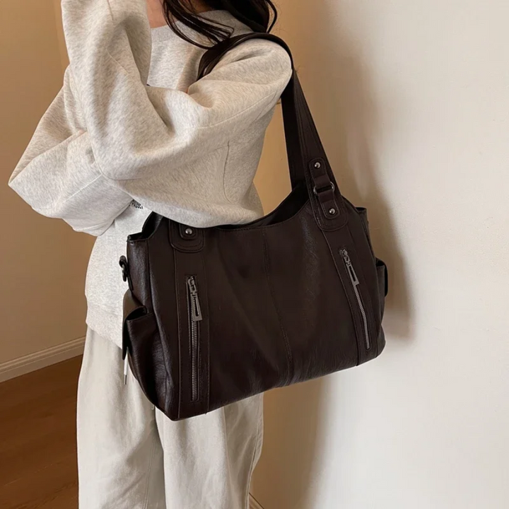 Stylish women's shoulder bag made from high-quality vegan leather, available in black