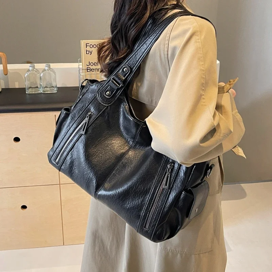 Black vegan leather handbag for women, perfect for daily use and fashion