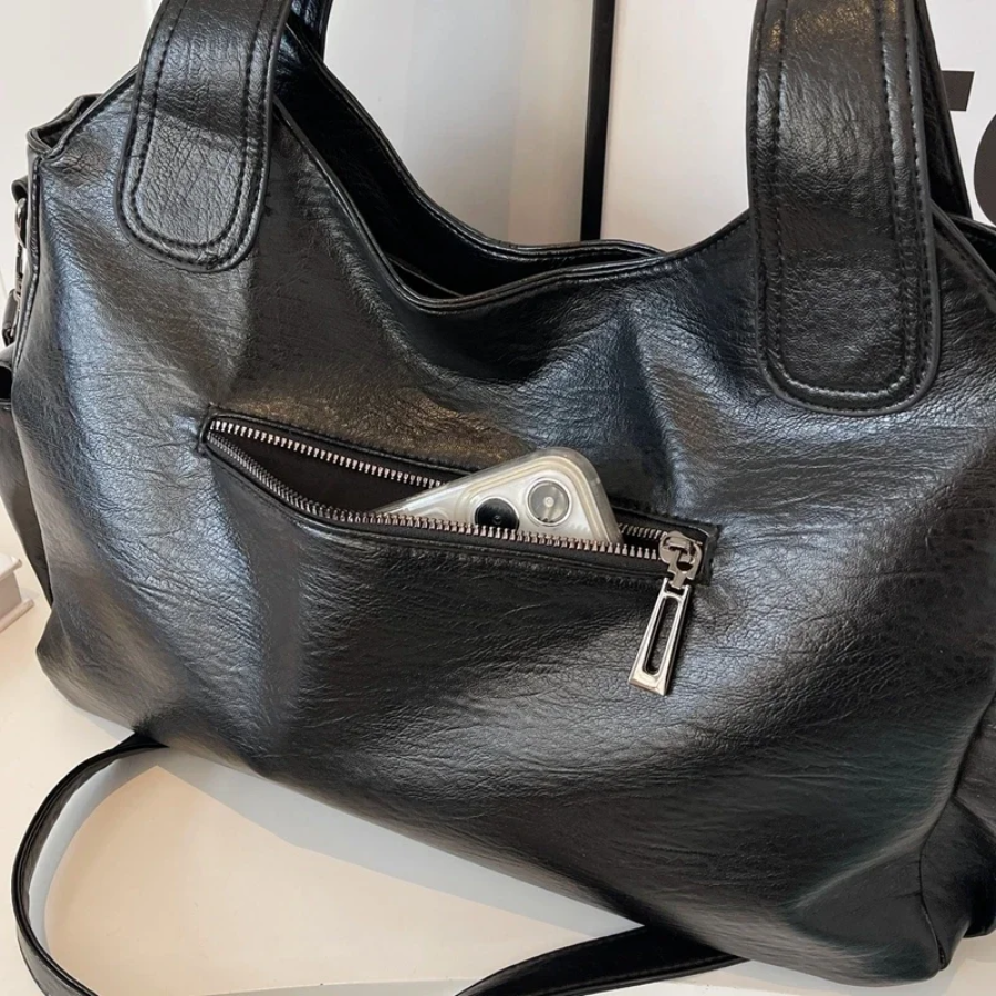Espresso women's shoulder bag with secure zip closure, chic and functional