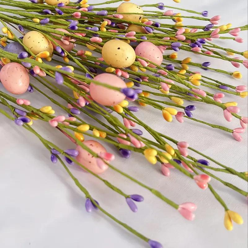Colorful Easter branches adorned with bright eggs, perfect for cheerful spring home decor and seasonal table accents.