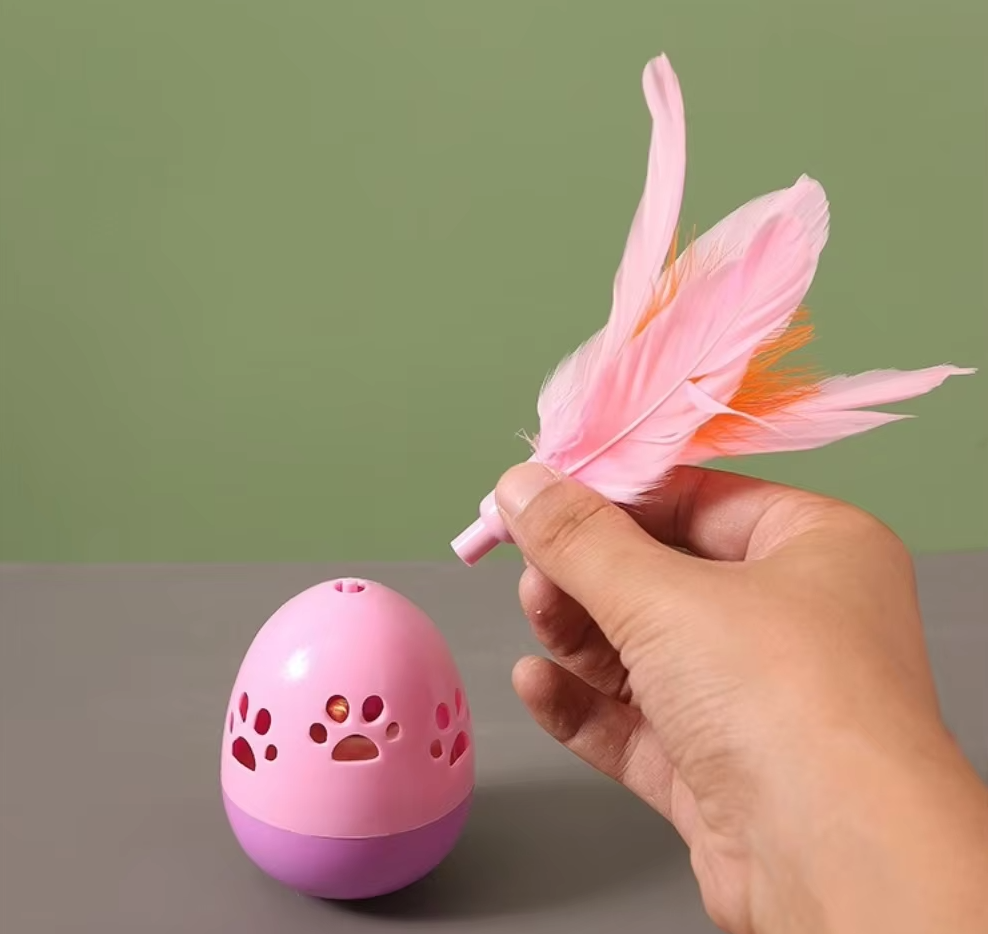 Engaging feather cat toy ball encourages active play & mental stimulation.