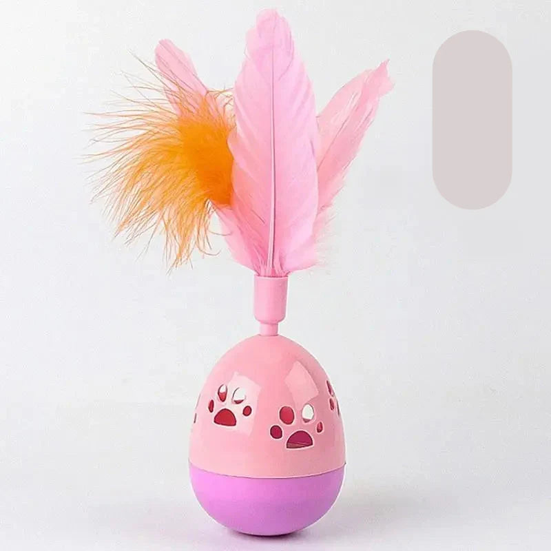Interactive cat toy ball with vibrant feathers for kitten's active play and enrichment.