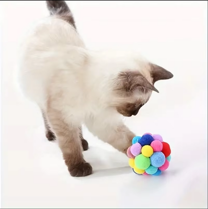 Soft Colorful Cat Pompom Toy Ball. Ideal interactive pet toy for kitten play, feline enrichment, and stimulating fun.