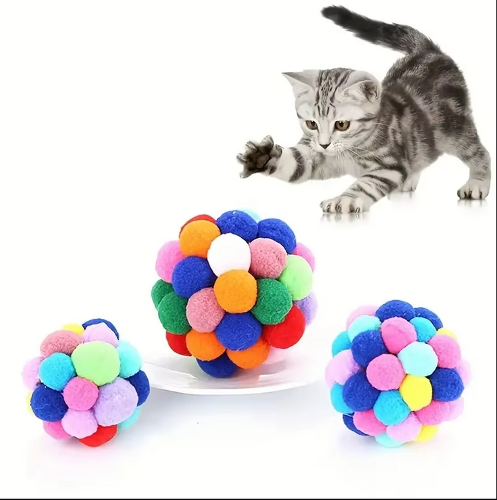 Assorted Colorful Pompom Cat Toys. Soft, interactive balls for playful pets, promoting healthy cat play & enrichment.