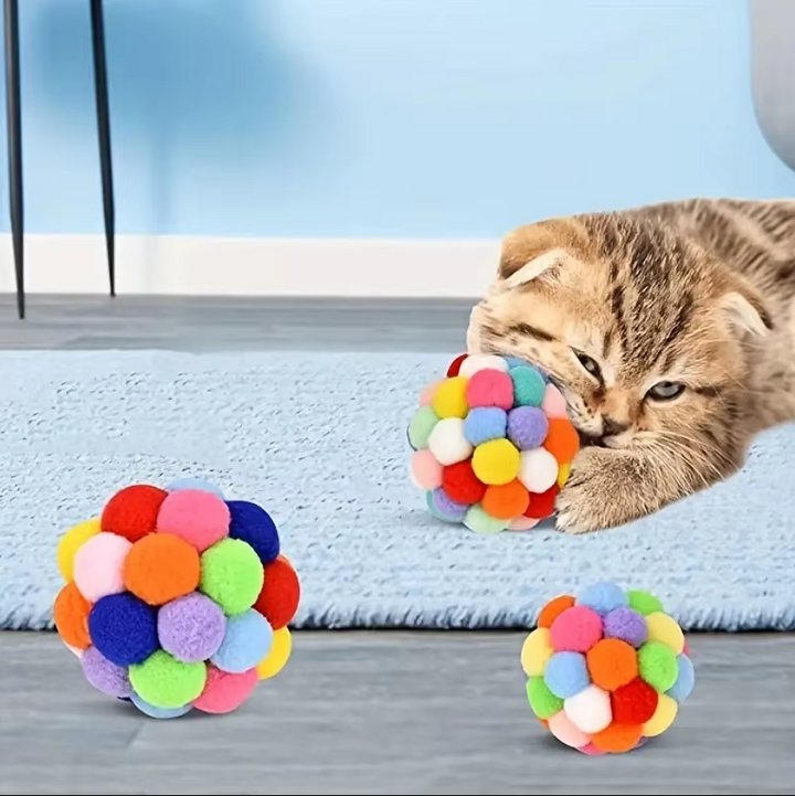 Soft Pompom Ball Cat Toy. Engaging, colorful interactive toy for stimulating play, enrichment, and happy feline fun.