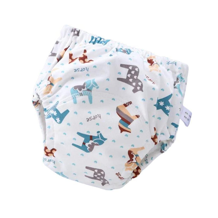 Happy baby wearing a colorful reusable swim diaper, enjoying water play. Adjustable fit for infants.