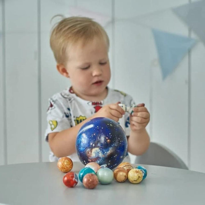 High-quality wooden solar system toy set, durable planets and sun for children's educational space exploration.