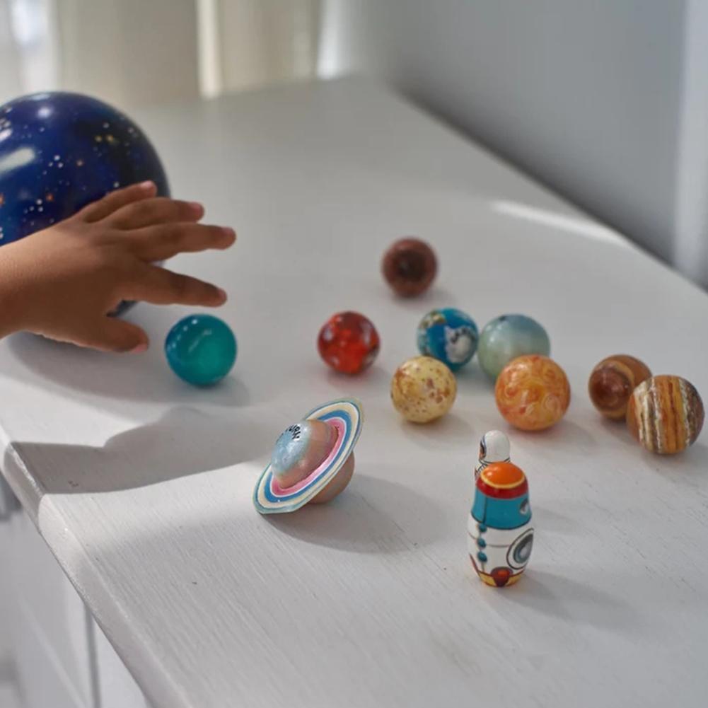 Beautifully crafted wooden solar system planet set, perfect educational gift for kids & a charming nursery display.