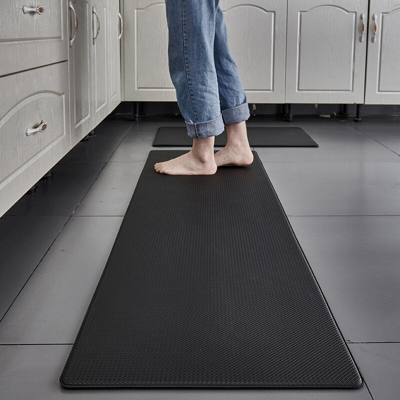 Waterproof anti-slip kitchen rug, PVC comfort mat for kitchen floor safety and cushioning.
