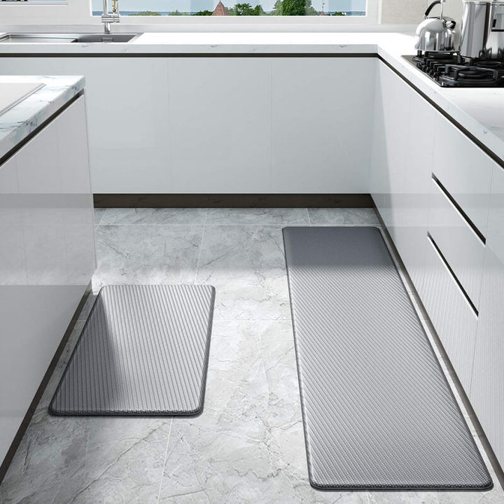 Versatile waterproof kitchen rug, anti-slip comfort mat for kitchen, laundry, or standing workstations.
