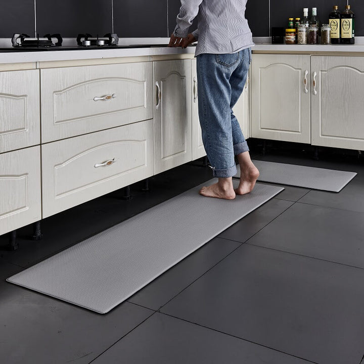 Protect your floors with this anti-slip waterproof kitchen mat, cushioned PVC rug for comfort & safety.