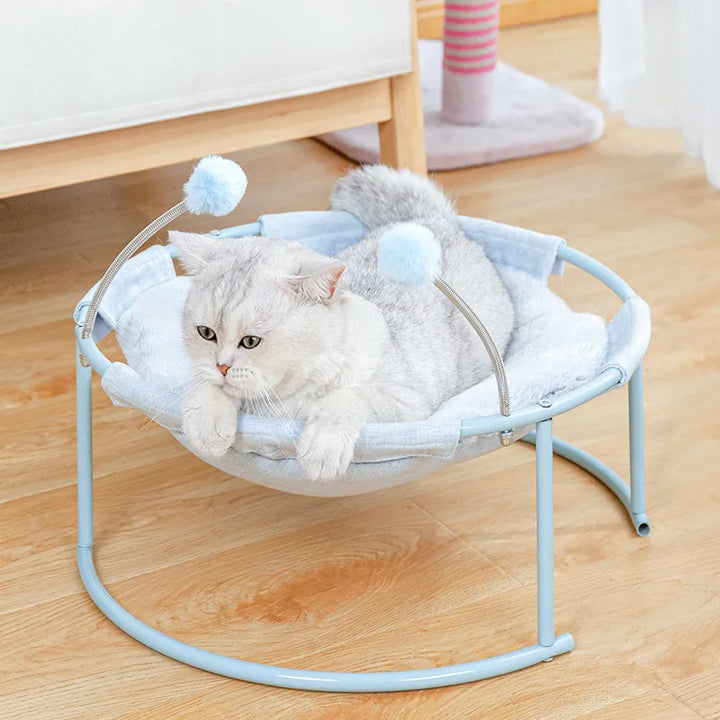 Comfortable round cat hammock lounger, a modern pet bed with soft cushion for ultimate cat relaxation.