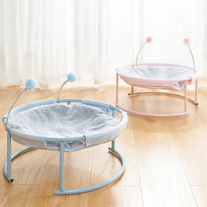 Cozy cat lounger, a round pet bed & hammock for deep relaxation, featuring soft fabric & modern design.
